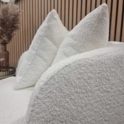 cuddle chare side view in a living room