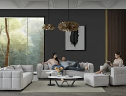 A family relaxing on neutral sofas