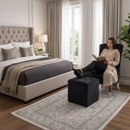 a woman relaxing in her bedroom chair