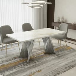 a modern marble dining table with silver base