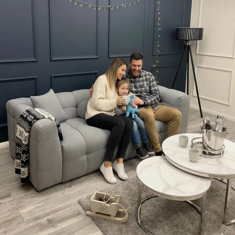 family sitting on a bubble sofa in living room