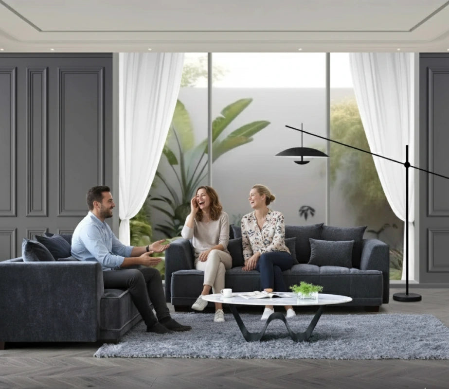friends enjoying laughter while sitting on a sofa set