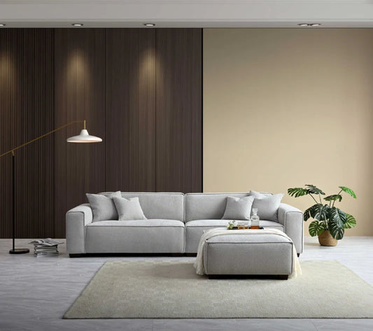 pebble colour sofa with a footstool