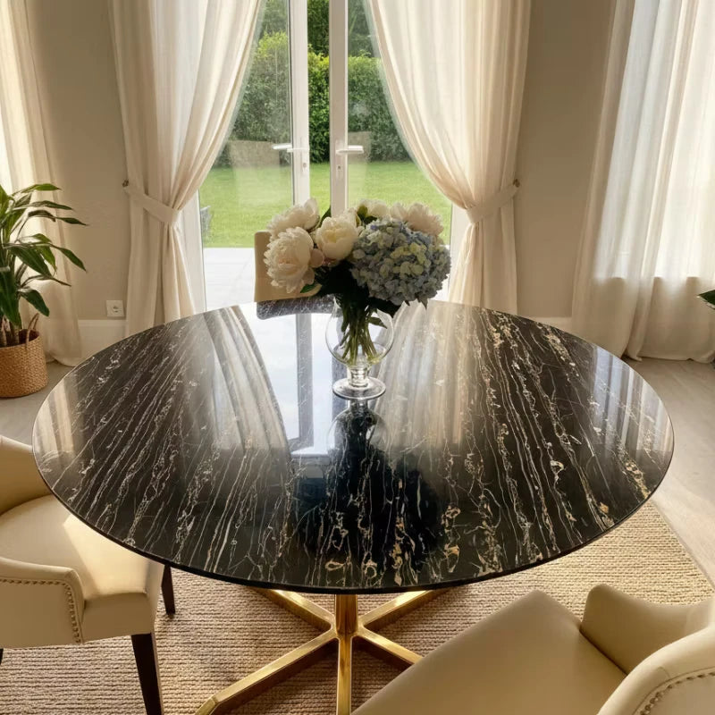 Marble Dining Table with Gold Legs at evening