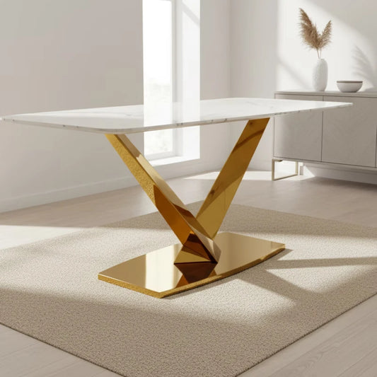 Modern Dining Table with Gold Legs in a room