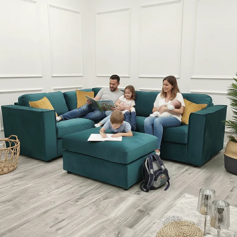 A family sitting on a sofa in a living room
