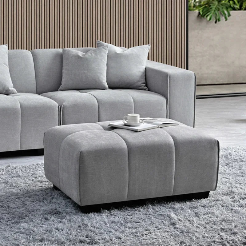 grey corner sofa and a stool