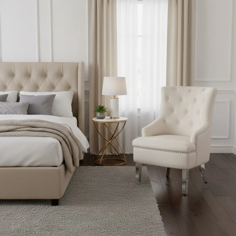 a wingback chair in a bedroom