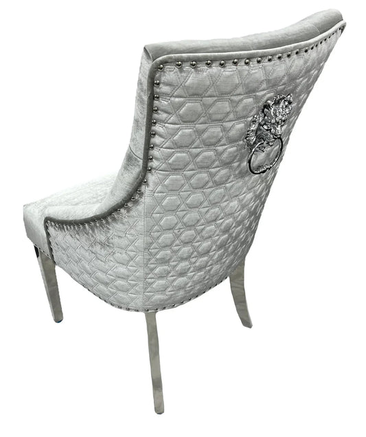 grey and silver dining chairs back view