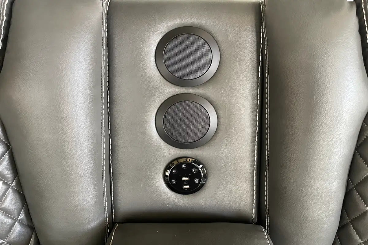 grey recliner sofa with speakers