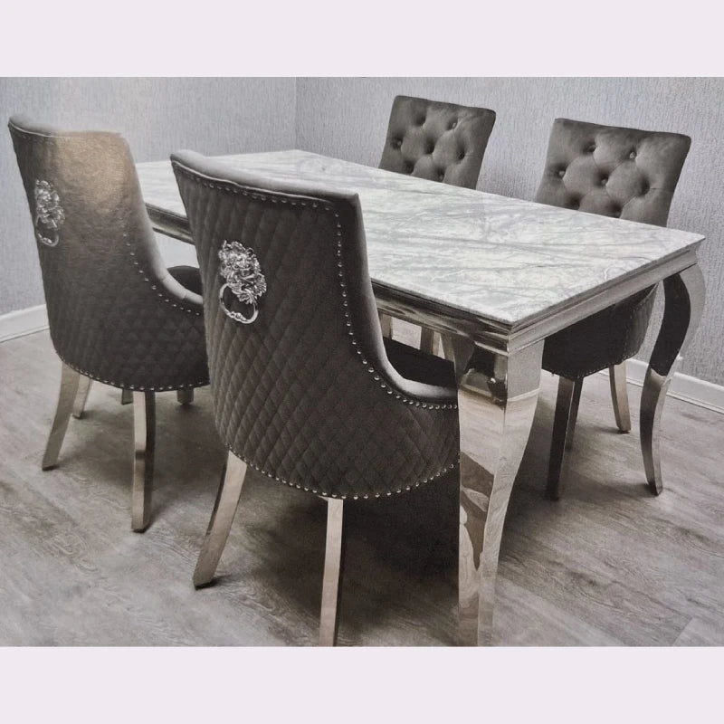 marble table paired with velvet seating
