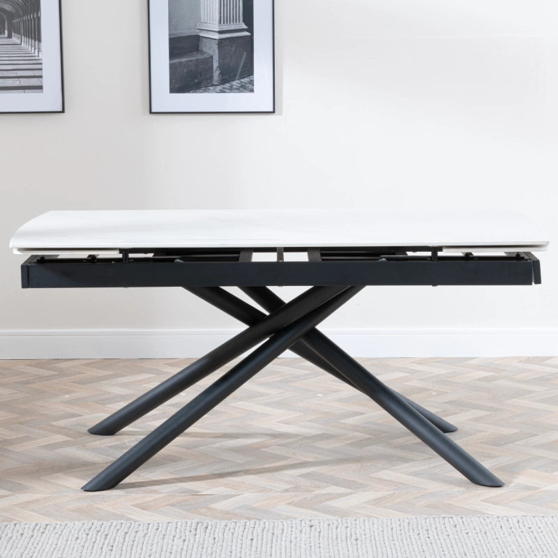 white cross legged dining table
